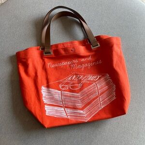 ANYA HINDMARCH-CANVAS TOTE-
Orange “Newspaper and Magazine “ with leather strap